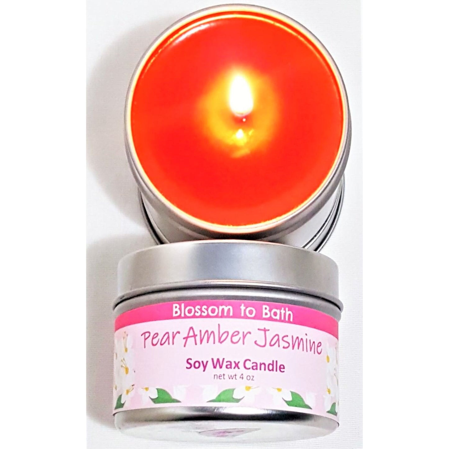 Buy Blossom to Bath Pear Amber Jasmine Soy Wax Candle from Flowersong Soap Studio.  Fill the air with a charming fragrance that lasts for hours  A scent that lets you escape to an island paradise of pear, jasmine, and warm spices.