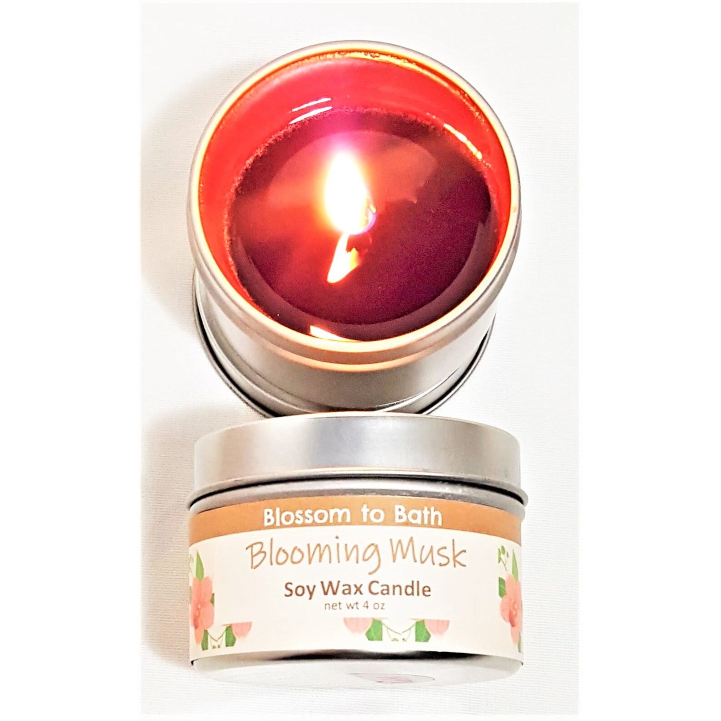 Buy Blossom to Bath Blooming Musk Soy Wax Candle from Flowersong Soap Studio.  Fill the air with a charming fragrance that lasts for hours  A sensual floral and musk scent that is subtle and feminine.